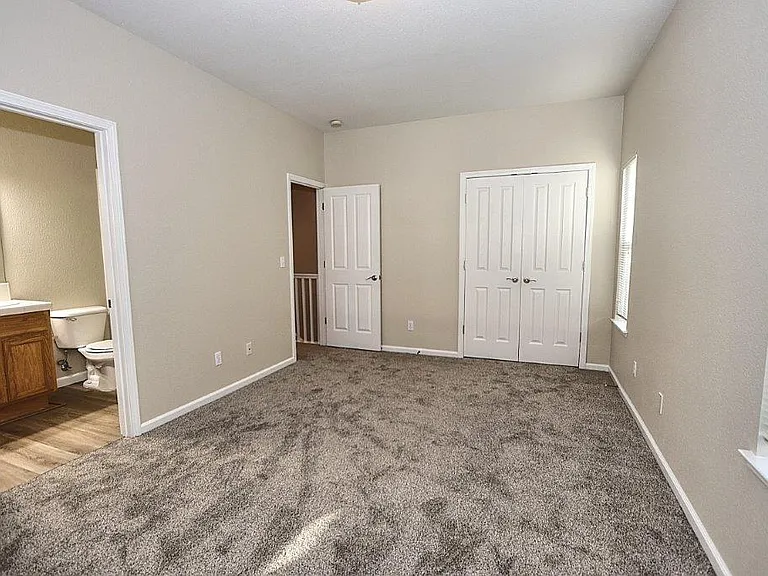 upstairs bedroom with private bathroom