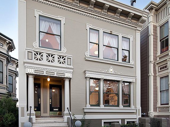 Beautiful front facade & entry porch. Flat for rent is the lower flat, one flight of steps up from street.
