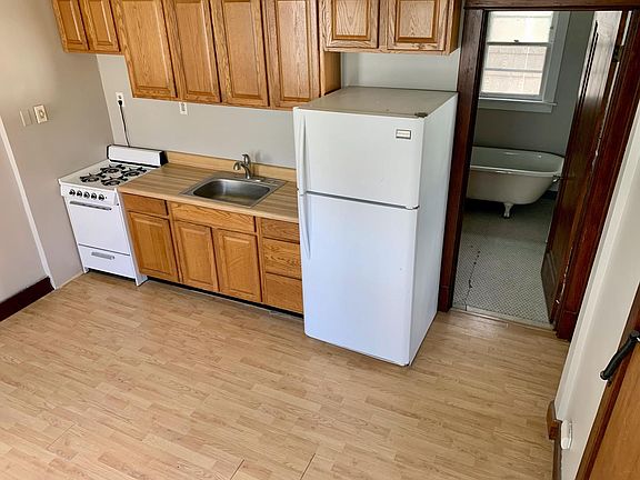 kitchenette with standard-size fridge