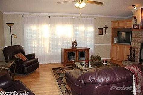 Laminate flooring. Single hung windows.