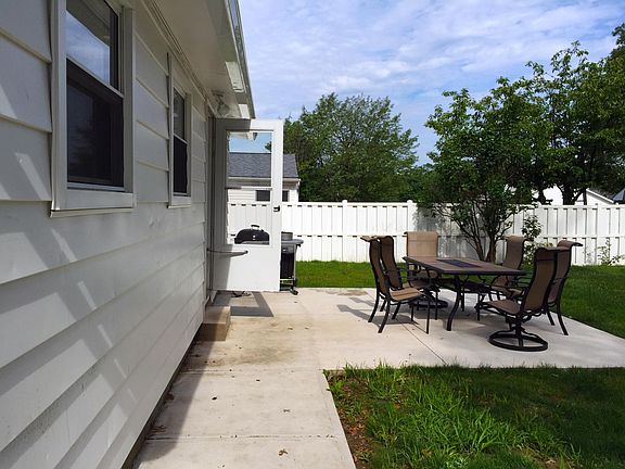 Back Patio and Sidewalk (Patio Furniture Included)