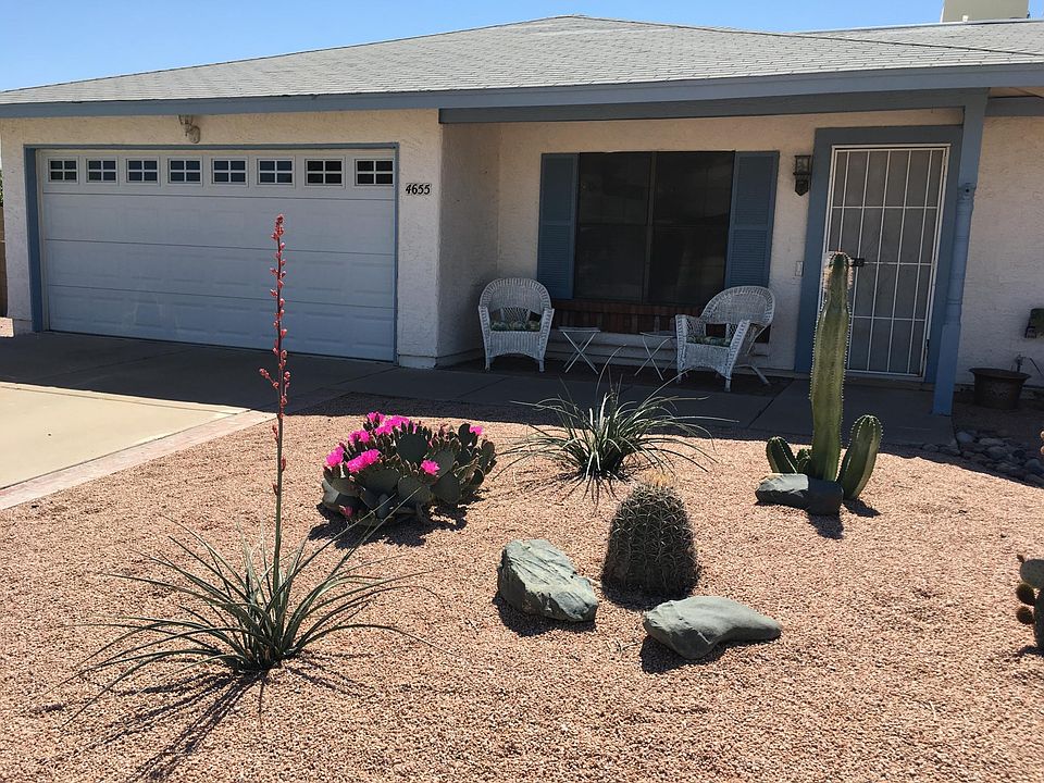 Front yard with sitting area for morning coffee.
