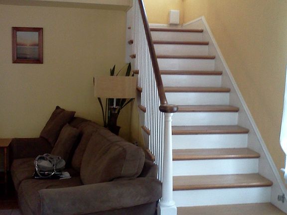 Stairs from entry/living rm