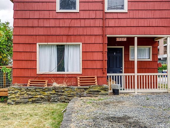 The cute blue front door welcomes you into the home.  