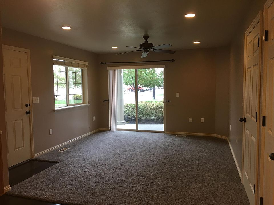 Family room with sliding door to covered patio