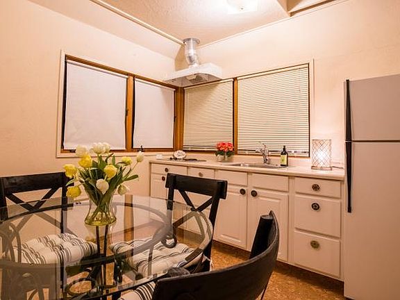 This is the kitchen and dining space. A full oven with stovetop was added since this photo was taken!