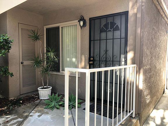 Front door with security gate.