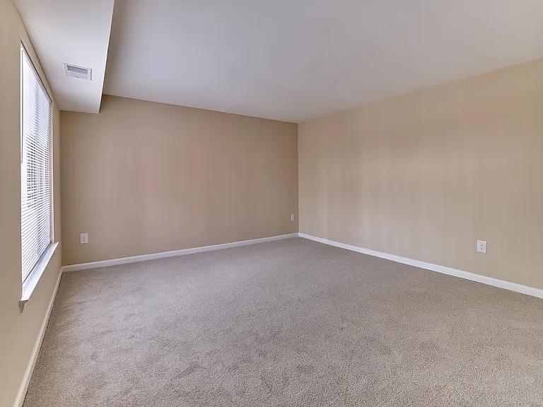 Bright, spacious bedroom with plush carpeting in this 2 bedroom, 2 bathroom apartment at North Crossing in Willow Grove, PA.