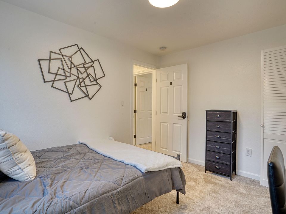 This cozy room offers a full size bed with bedding included.