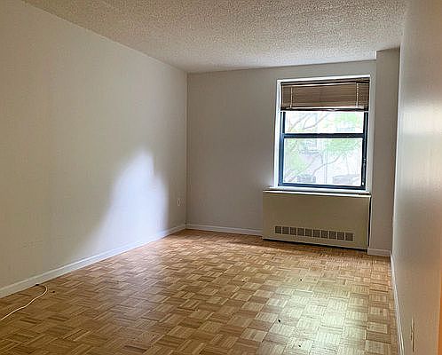 2nd image of 225 E 6th St APT 3C