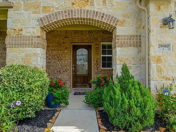 Beautiful view of this wonderful entrance! The brick inlays are upgrades to this property!