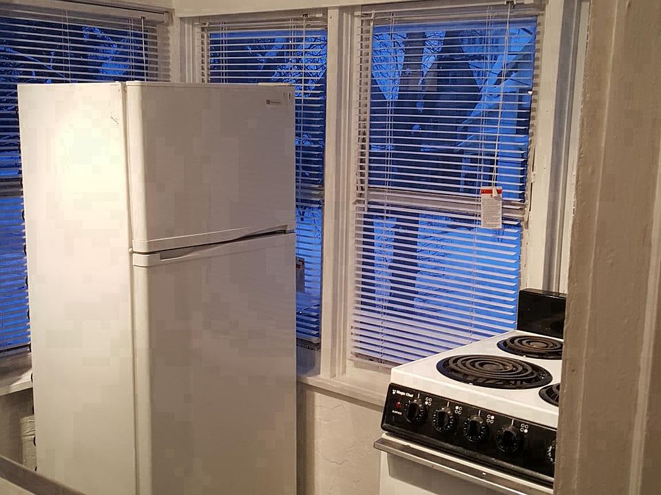 Small and efficient kitchen with tin ceiling