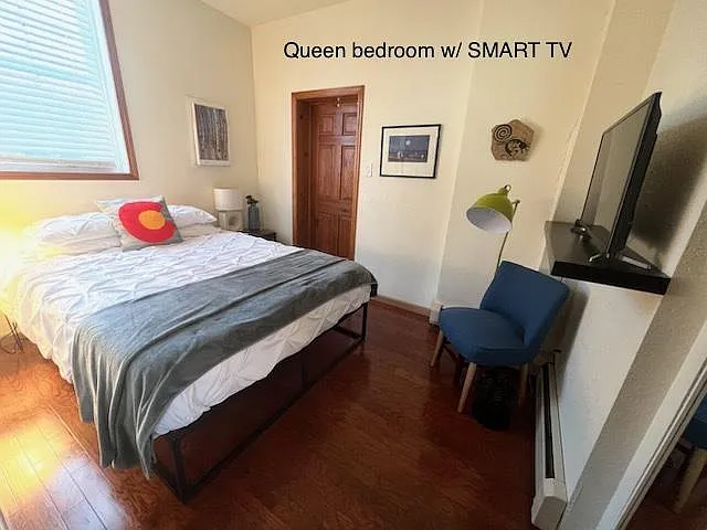 QUEEN bedroom with TV