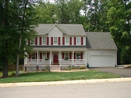 Country Front Porch, Aggregate Walkway, 2 Car Garage!