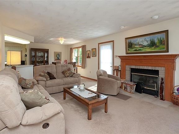At nearly 1600 square feet of living space all on one level. This open concept ranch, home is move in ready and offers a firepla