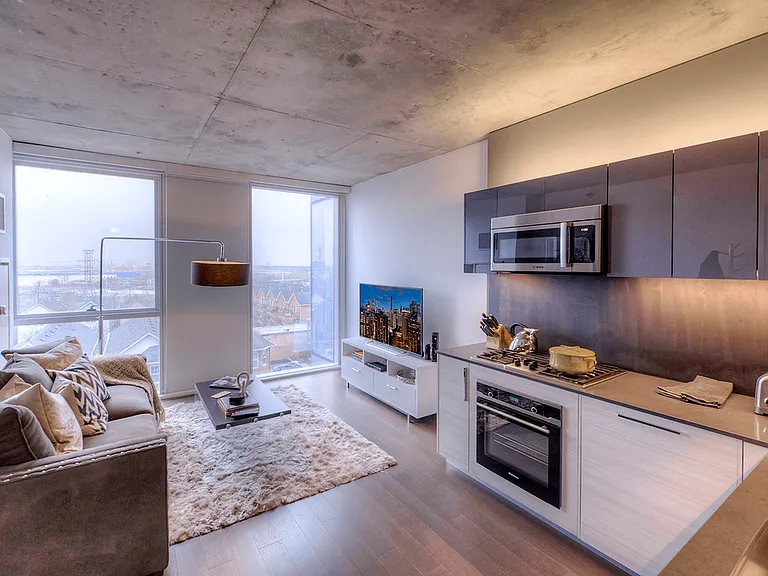 Model apartment kitchen and living area