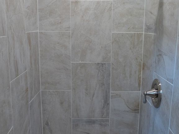 New custom tile bathrooms
