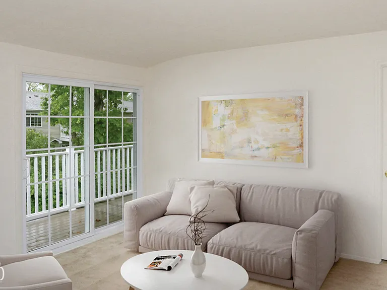 Living room and view of patio doors at Lakeside Village, East Patchogue