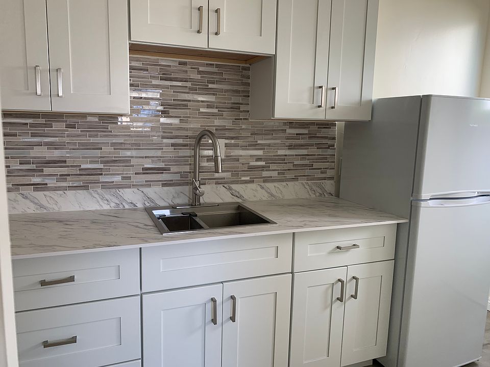 New kitchen counters, sink and backsplash.