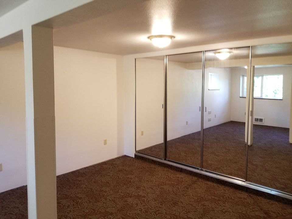 Portion of bedroom area. With mirrored full width closet.
