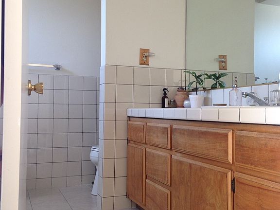 oversized bathroom with full bath and shower