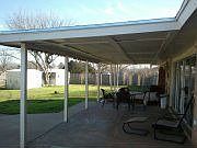 large covered patio, 2 storage buildings