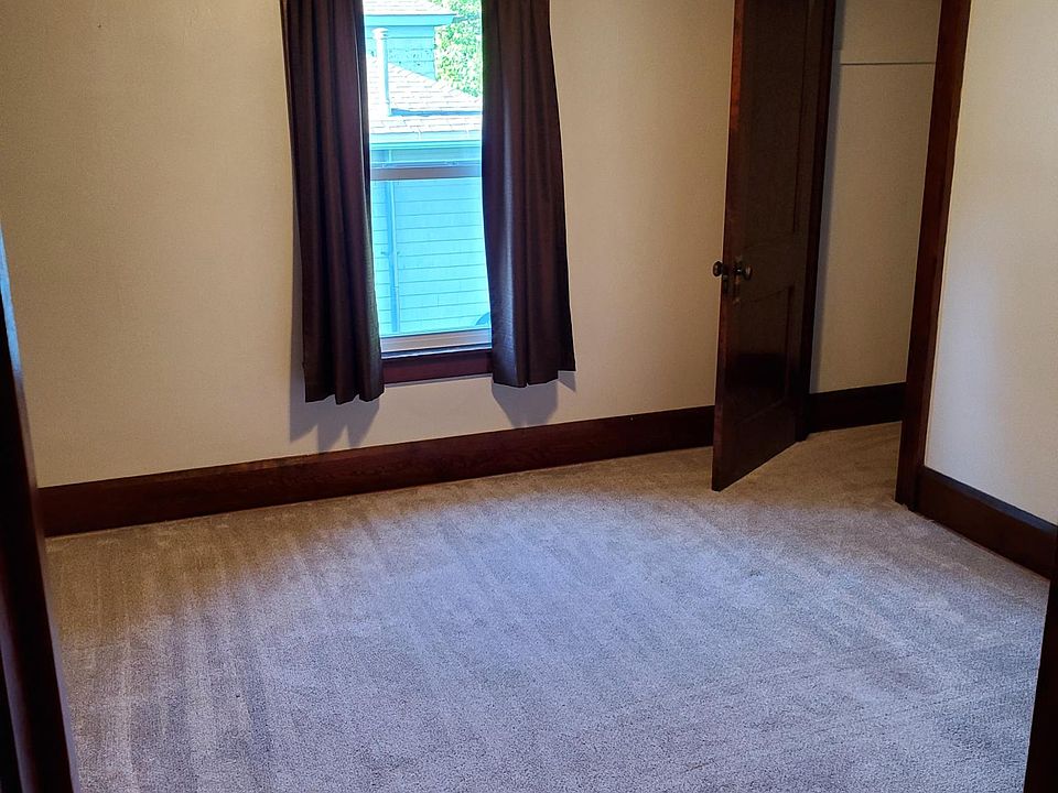 welcoming, spacious bedroom with full size closet, one window