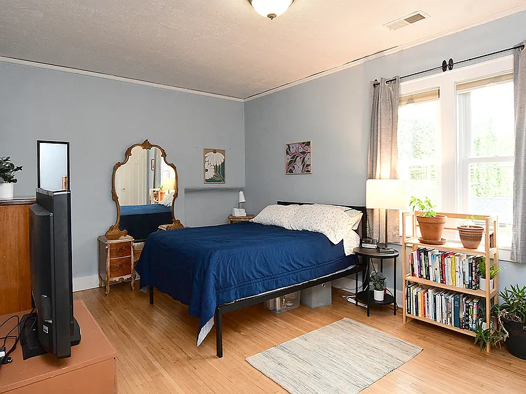 Bedroom one with two closets