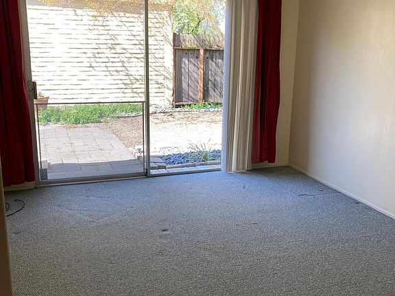 Master Bedroom, with a sliding door to the backyard.