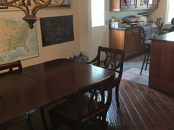 Dining room and partial kitchen