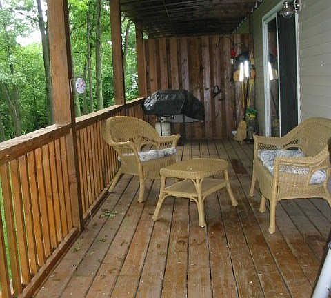 Huge deck - 2 sliders and stairway to the grounds