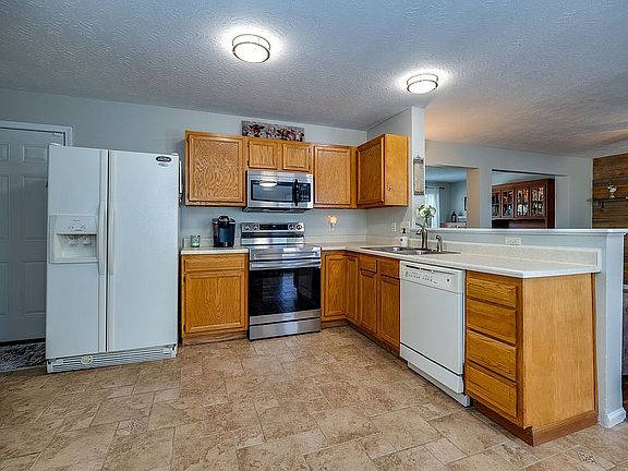 5th image of 6587 N Andover Way