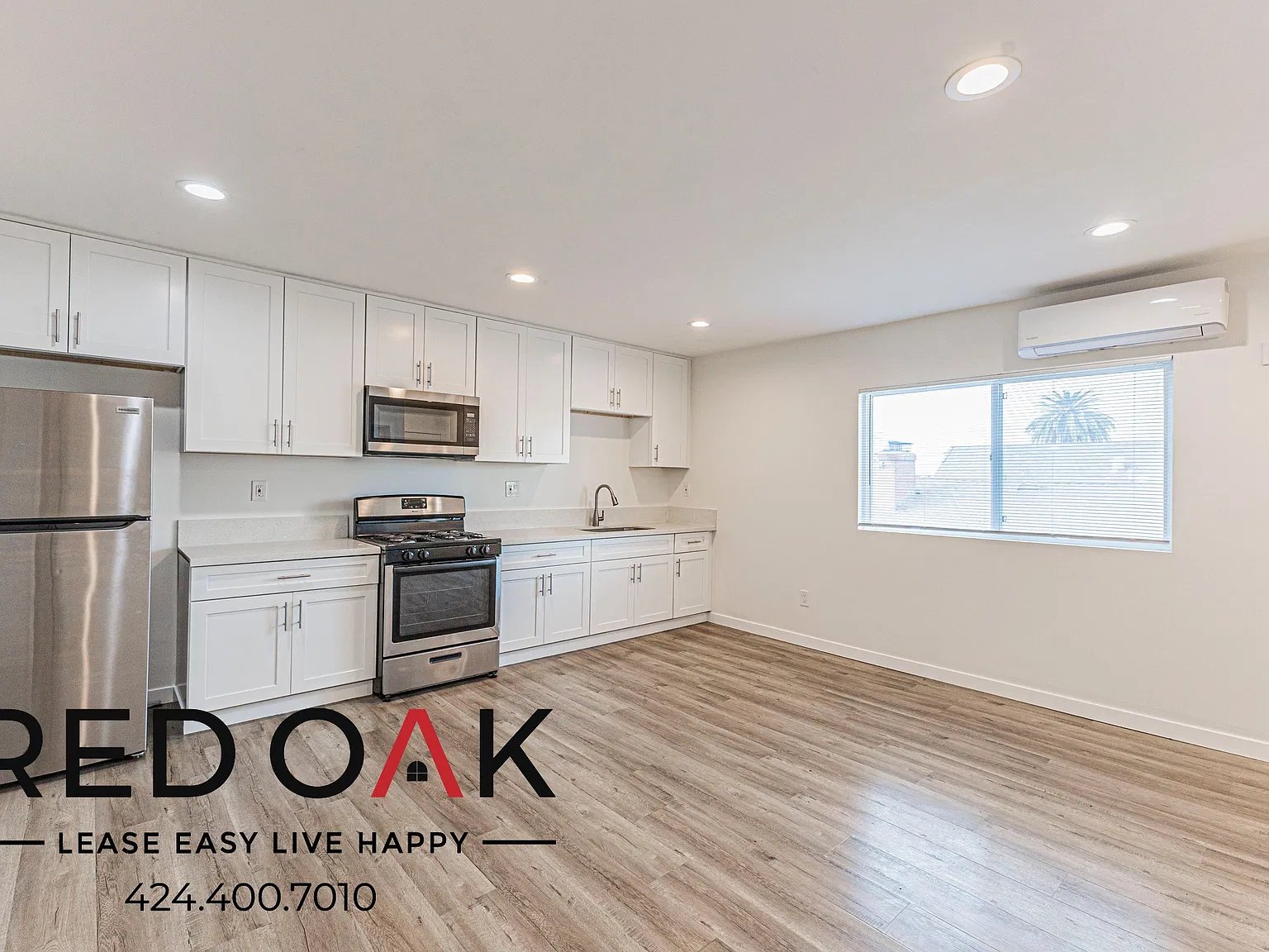 Open 3-Bed with Stainless Steel Appliances, Air Conditioning, In-Unit Laundry and Parking Availab... — Photo 1