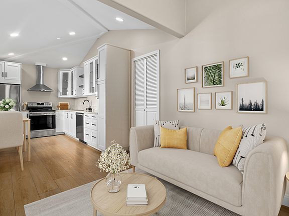Bright living area with modern finishes and open layout (digitally staged). Please note photo is not to scale