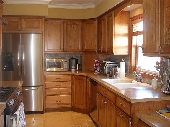 Remodeled kitchen with natural stone