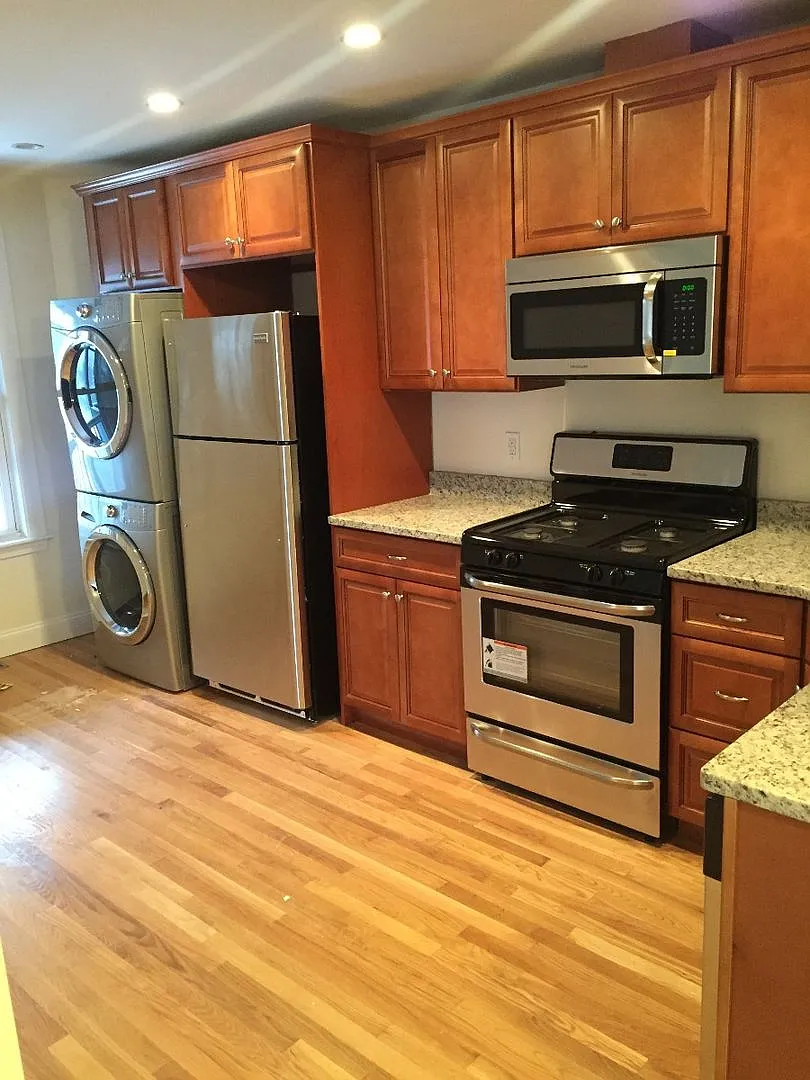 Nicely updated 3 bed with in-unit laundry in Brookline Village! — Photo 1