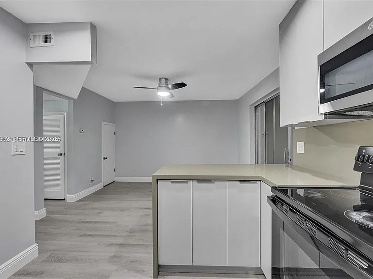 5963 NW 25th Ct #210 — Photo 11