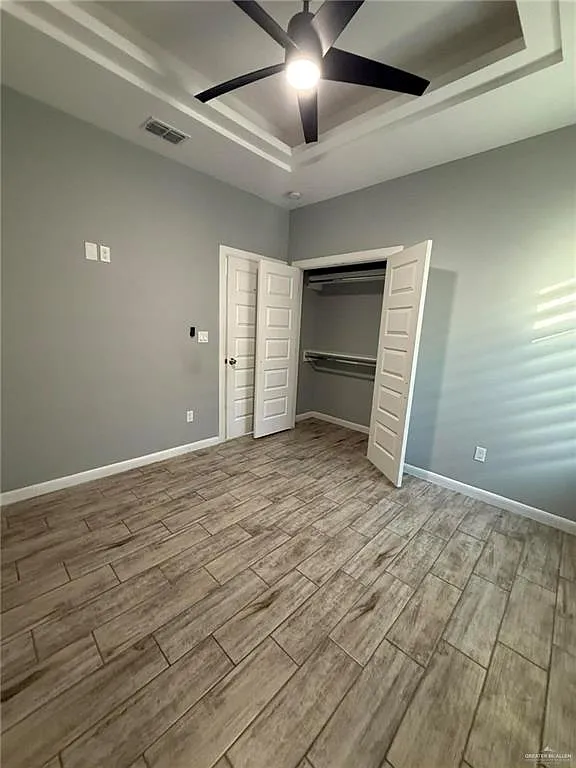Building Photo - 1316 S Xanthia St #4