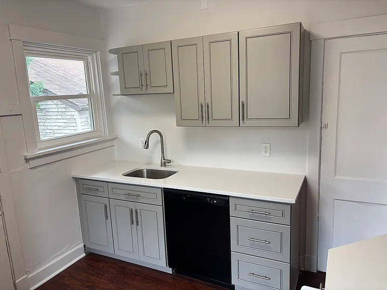 New kitchen with dishwasher.