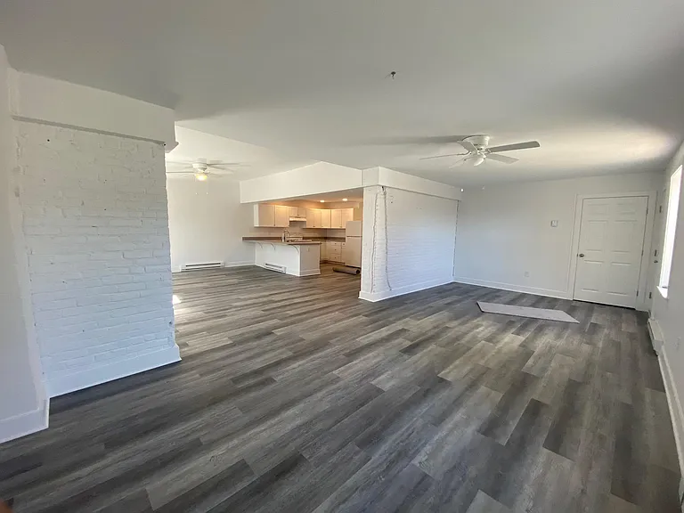 Living room looking into dining room/kitchen