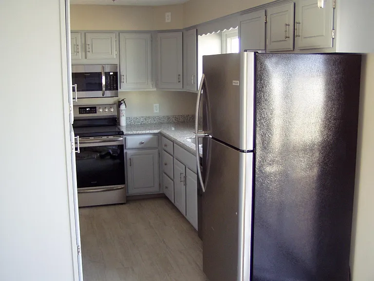 Kitchen--tile floor, new appliances
