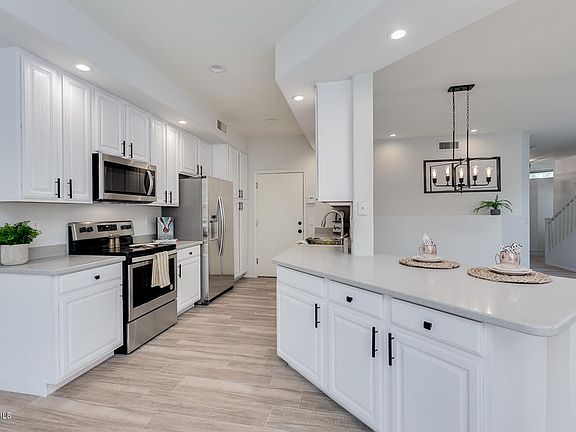 2nd image of 6510 S Hazelton Ln Unit 109