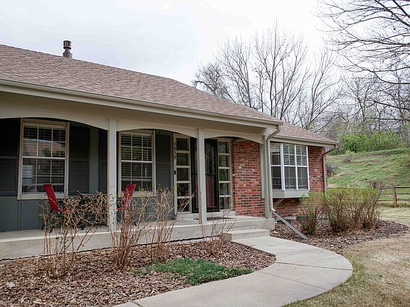 Front of house. This is the last unit on the row of townhomes with an open greenbelt on the side of the house.