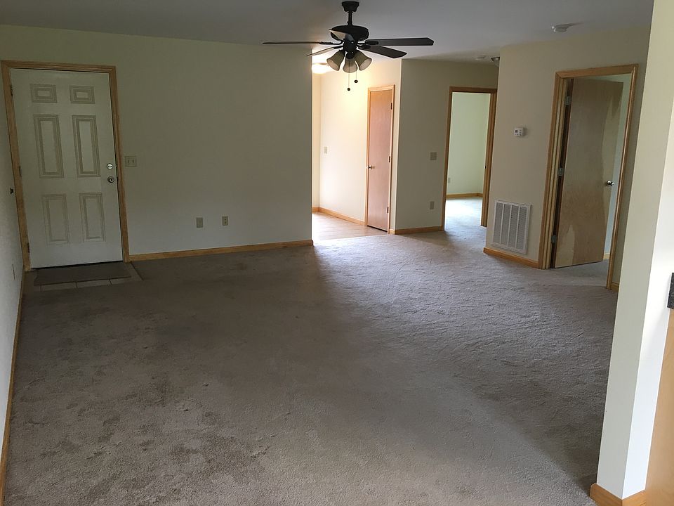Living room with access to both bedrooms, garage, hall bath and kitchen