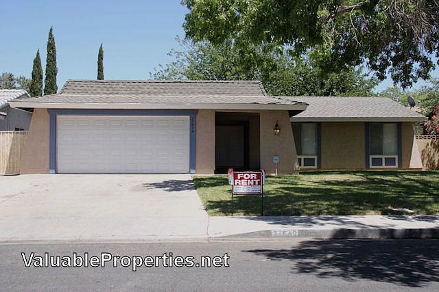 Timed sprinklers & remote garage opener
