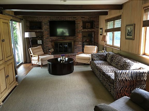 Family Room
						:
						Family room with sliding glass door to the patio. Expsd. brick, gas fireplace.