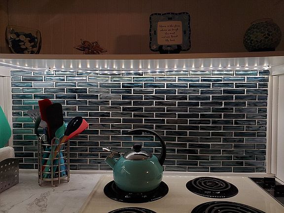 Aqua blue sparkly backsplash