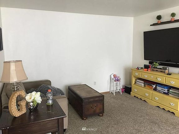 This is the other half of the living room. Perfect for television placement to avoid glare on the screen.