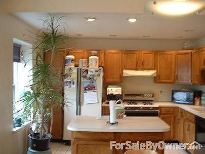 Before Photo of Demolished Kitchen
						:
						Imagine... rosewood cabinets granite new white appliances chimney, stone splash