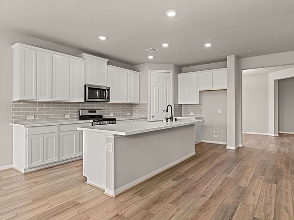Kitchen. Note Sample product photo - actual exterior and interior selections may vary by homesite